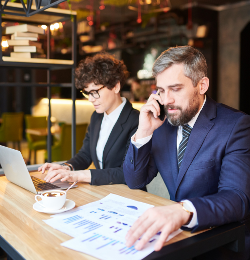 Business professionals analyzing data